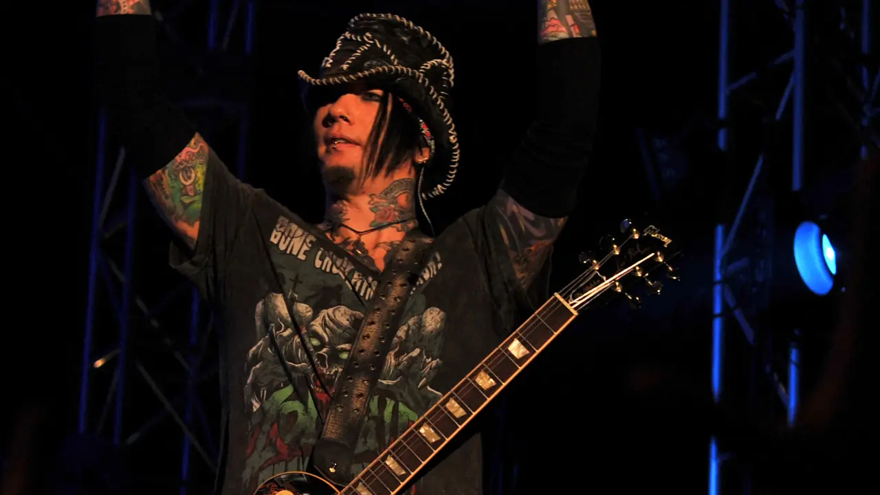 Performing some of their greatest hits from their debut album 'Appetite For Destruction', Indian fans sang along to 'Paradise City', 'Sweet Child o' Mine' and 'Patience' among others. In photo, guitar player DJ Ashba reacts to the crowd during his performance on Guns N' Roses' debut in India in Bengaluru in 2012