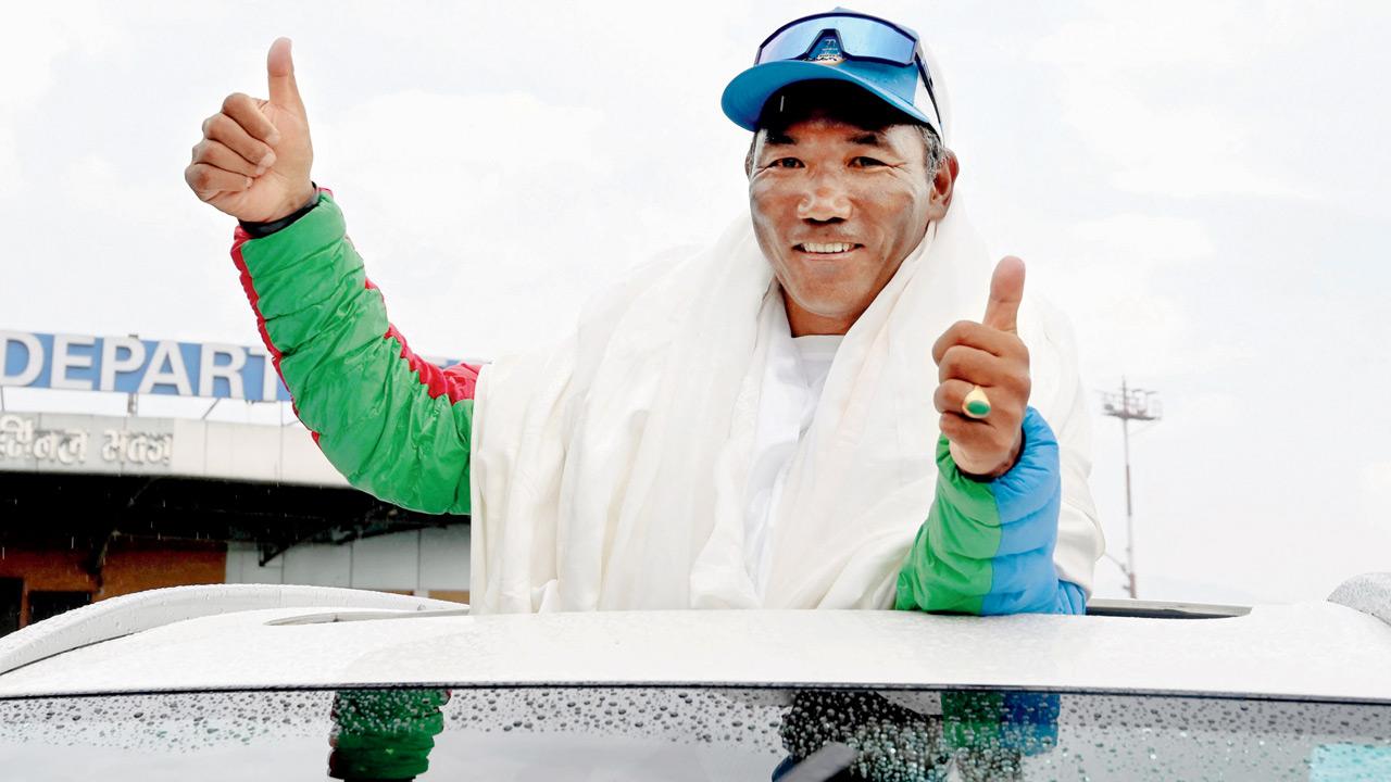 Mountaineer breaks his own record with 31st climb of Mount Everest