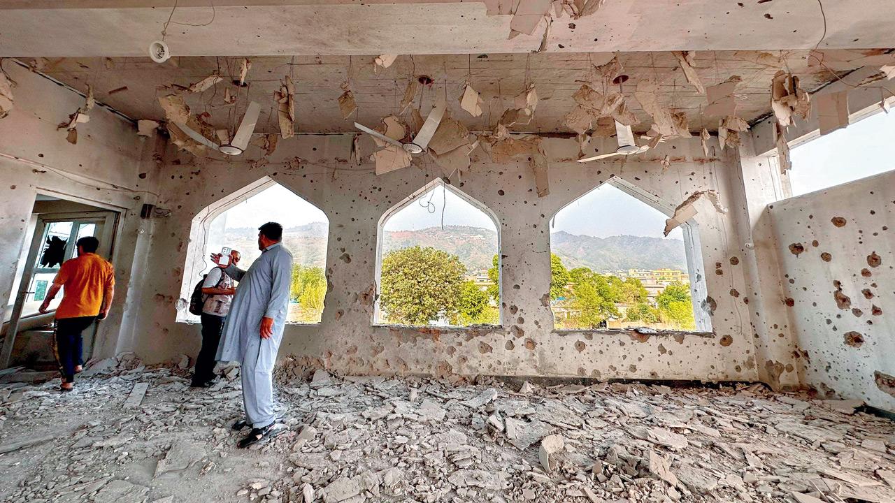 A general view of a damaged structure in the Kotli district of Pakistan-administered Kashmir on Wednesday, after Indian strikes. Pic/PTI