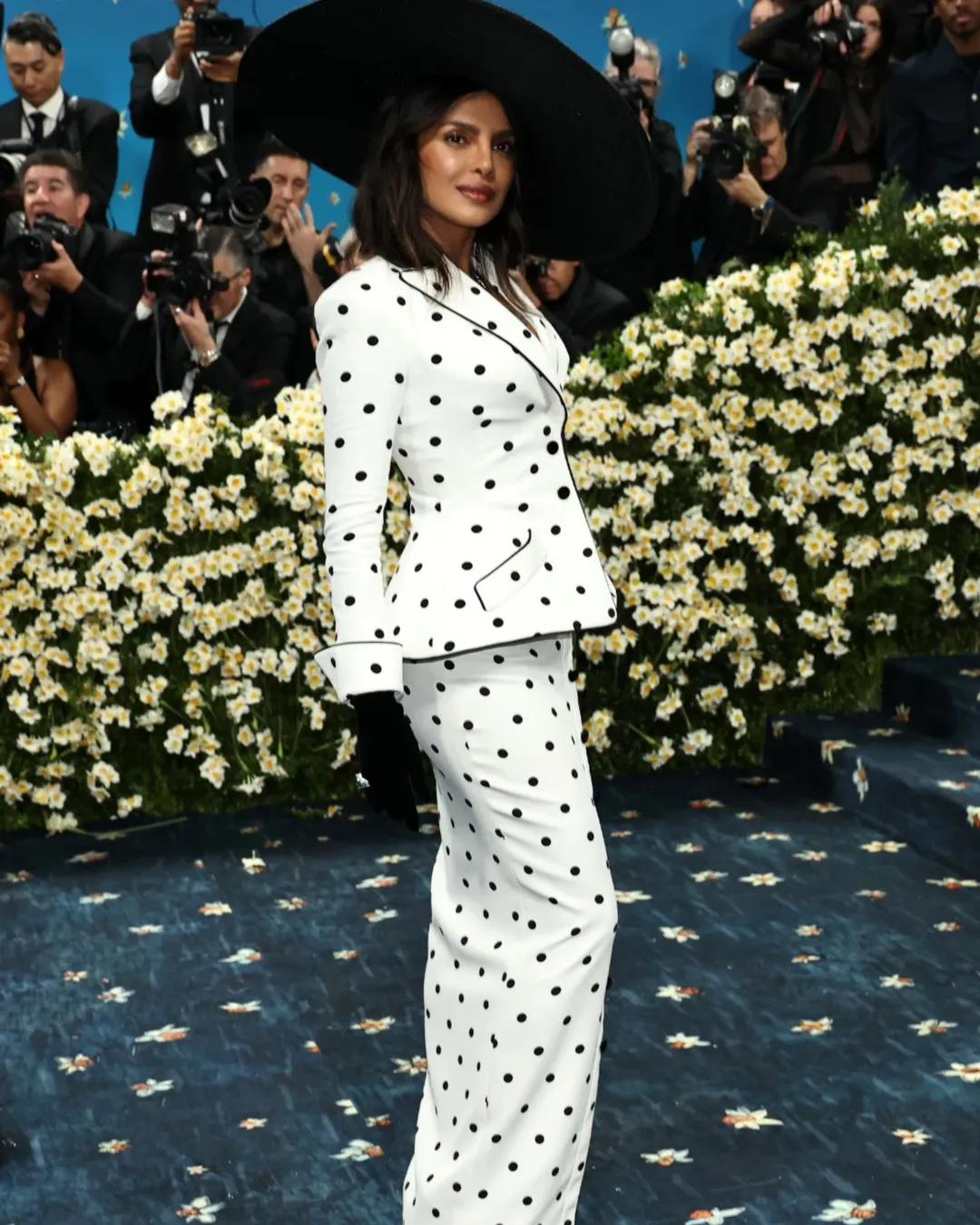 Chopra, walking the carpet for the fifth time, set the bar as she walked in a stunning polka dot outfit created by Olivier Rousteing for Balmain. When fashion meets luxury, her look included intricate jewellery, and the green emerald around her neck was impossible to miss