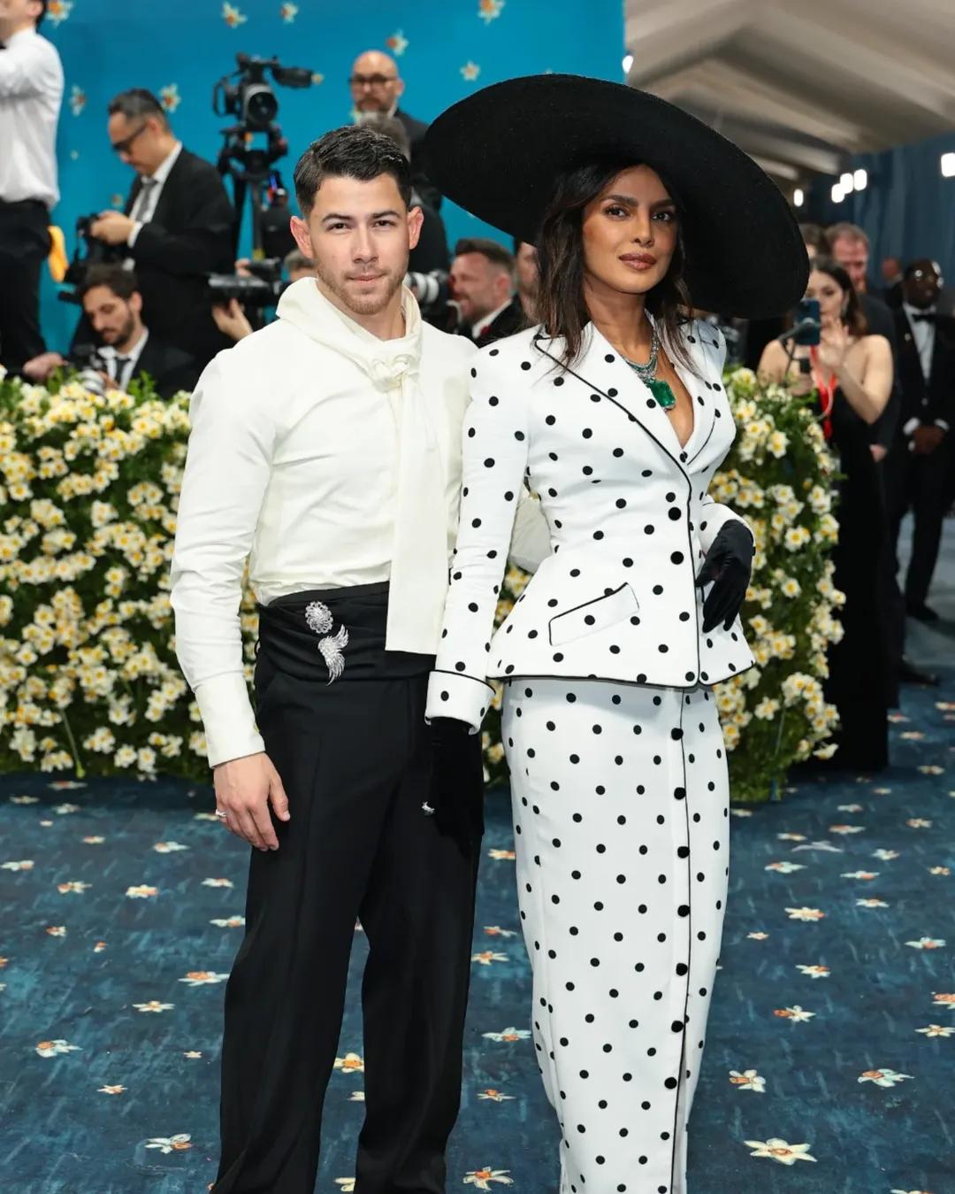 Power couple Priyanka Chopra and Nick Jonas walked the blue carpet of the Met Gala 2025, radiating elegance and high fashion drama as they made an appearance together, walking hand in hand. The couple was seen rocking colour-coordinated outfits while they celebrated the 'Superfine: Tailoring Black Style' theme of the year