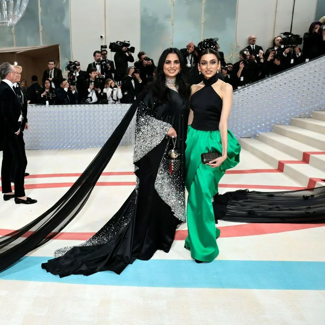 In 2023, Isha Ambani, in her third appearance, also chose Prabal Gurung for the theme Celebrating Camp: Notes on Fashion. She opted for a black one-shoulder gown with a long silk chiffon train. The train had crystals and pearls embellished around it. Isha Ambani paired this with a lot of Lorraine Schwartz jewellery, but the highlight of the night became her Chanel doll bag designed by Karl Lagerfeld. The bag became the talk of the town