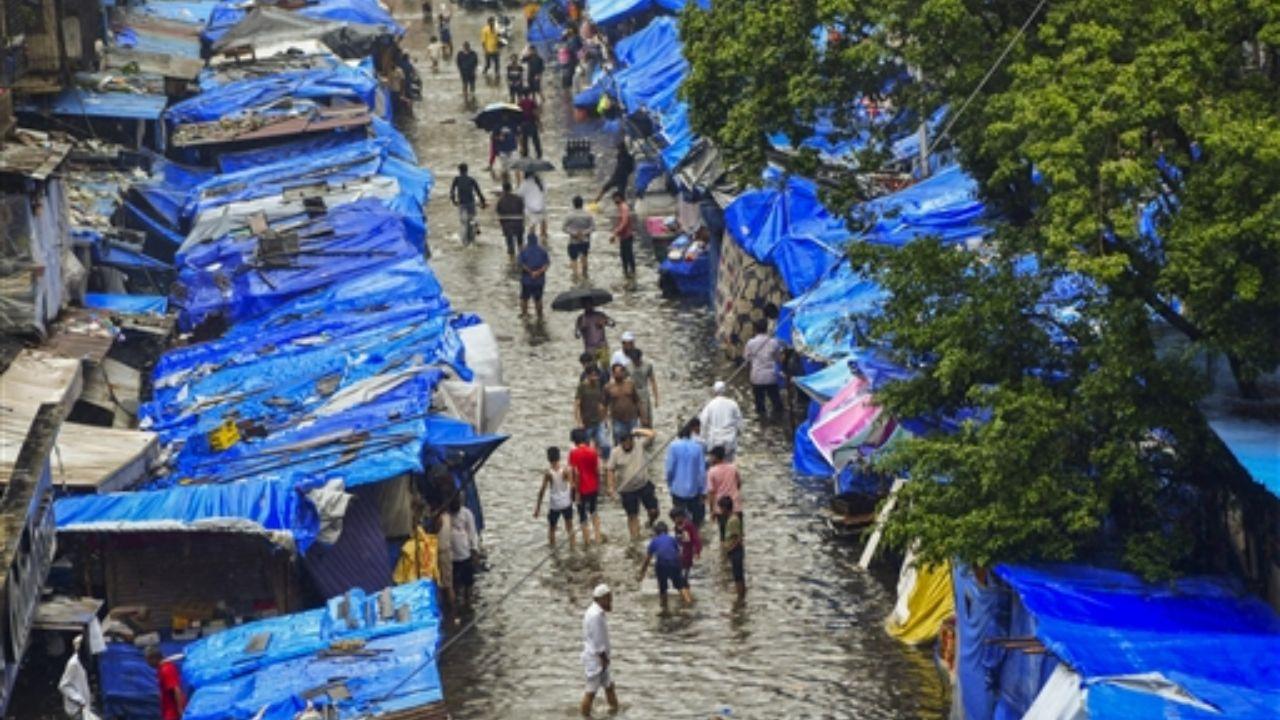 Lashing rains swamped India's financial capital, Mumbai, as the annual monsoon arrived nearly two weeks earlier than usual, according to weather forecasters