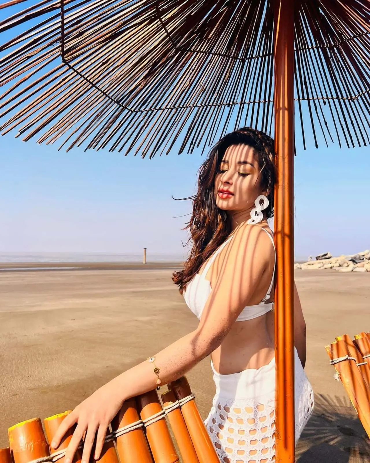 Nyrraa's beach look is all you want if you’ve planned your first Goa vacation with friends this summer. In this look, the actress wore a white bikini, and we are in awe of her striking appearance