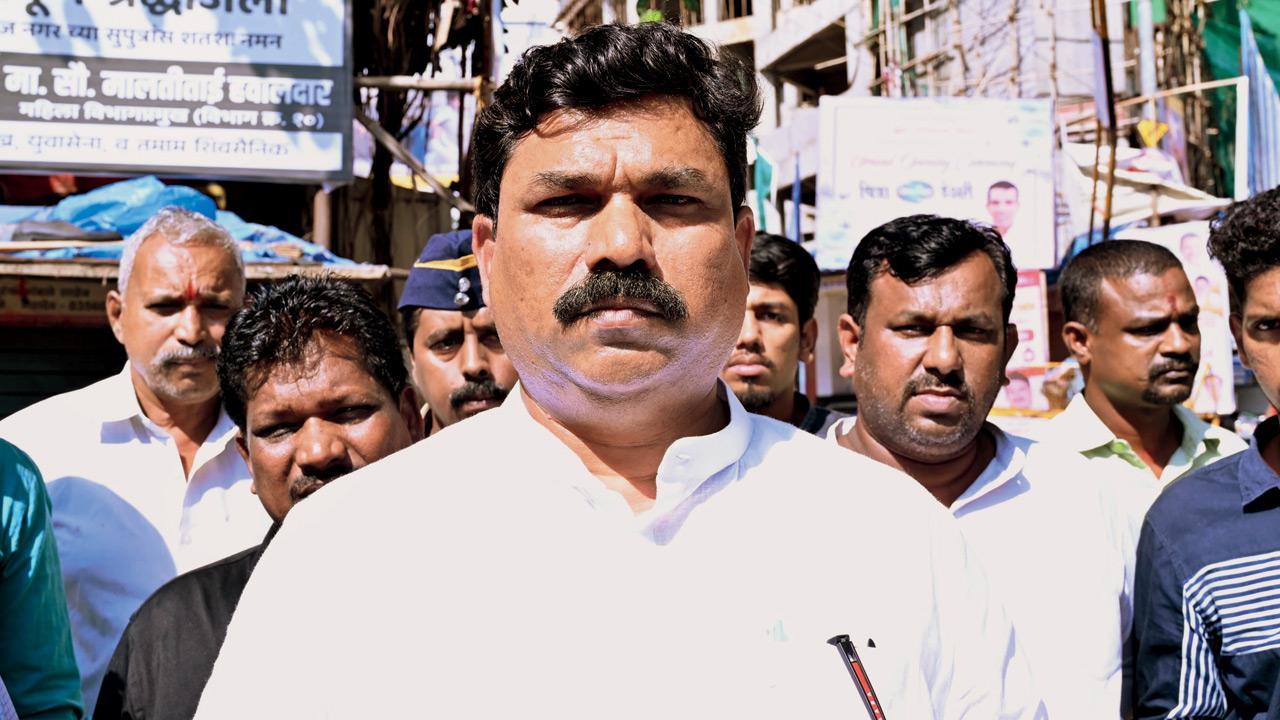 Parmeshwar Kadam, a Shiv Sena leader who is also a neighbour 