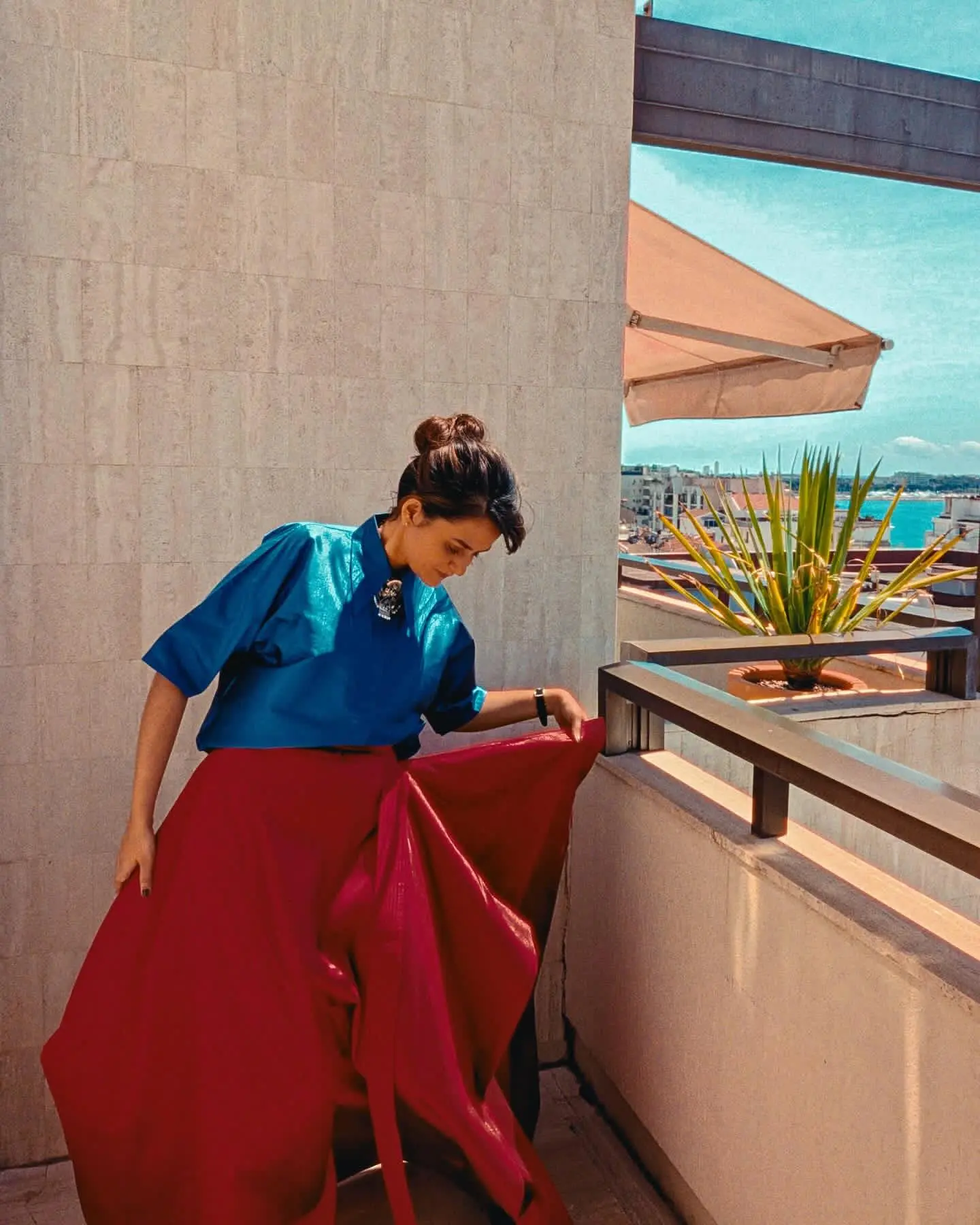Kapadia also attended the photocall at the opening ceremony of the 78th Cannes Film Festival in a striking ensemble — a blue blouse and red asymmetrical skirt by designer Payal Khandwala. Notably, Khandwala also dressed the acclaimed filmmaker for her Golden Globes 2025 red carpet appearance earlier this year
