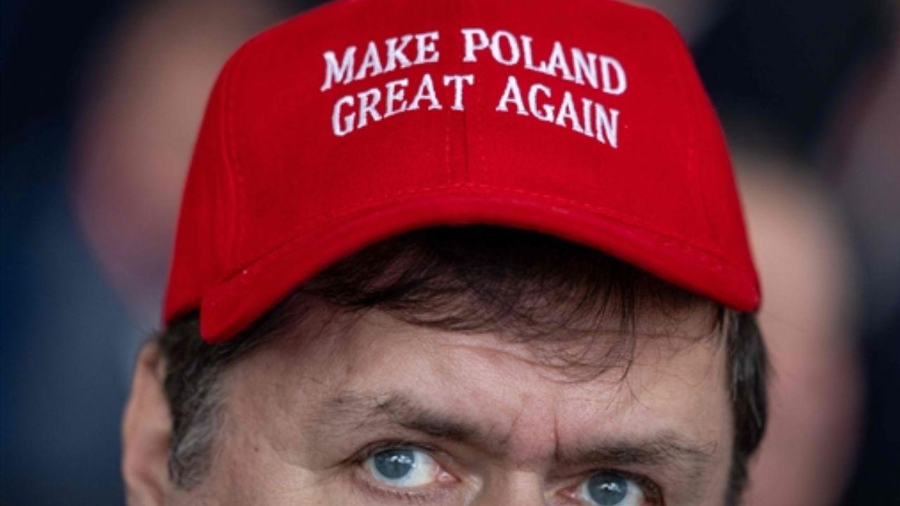 A participant wearing a baseball cap with 