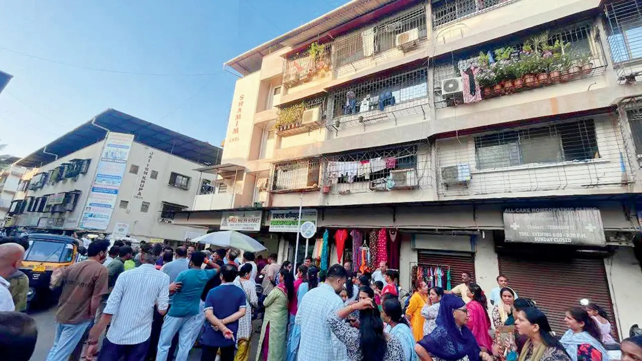 An undated photo of residents of six housing societies near Vasai station that are listed for demolition. Pic/By Special Arrangement