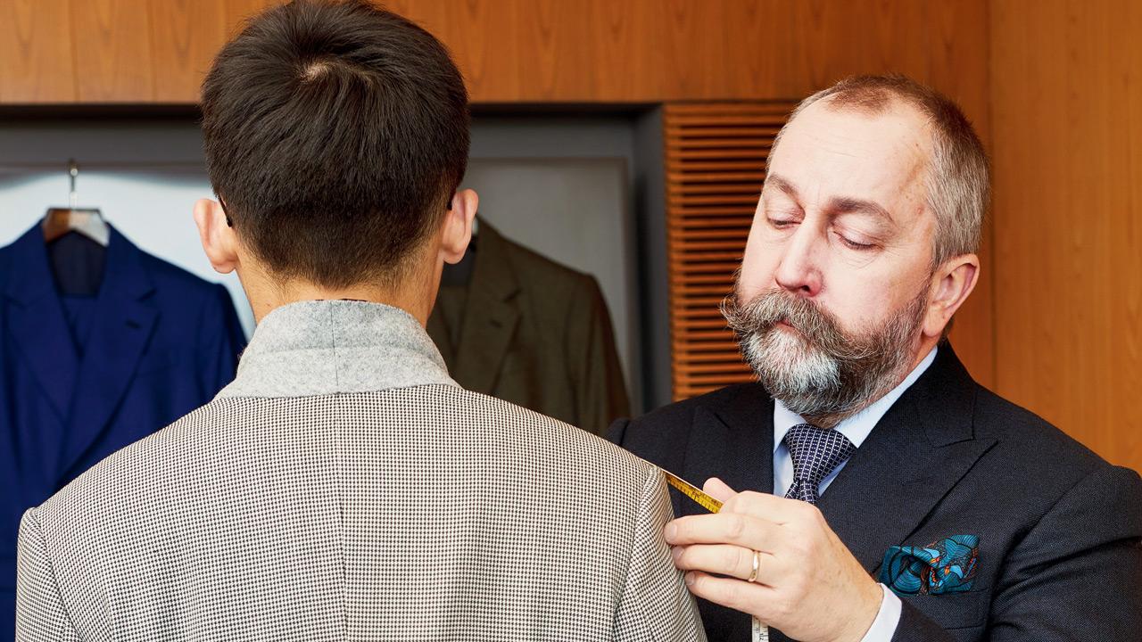 Robert Bailey works on a suit. PIC  COURTESY/FOUR SEASONS HOTEL
