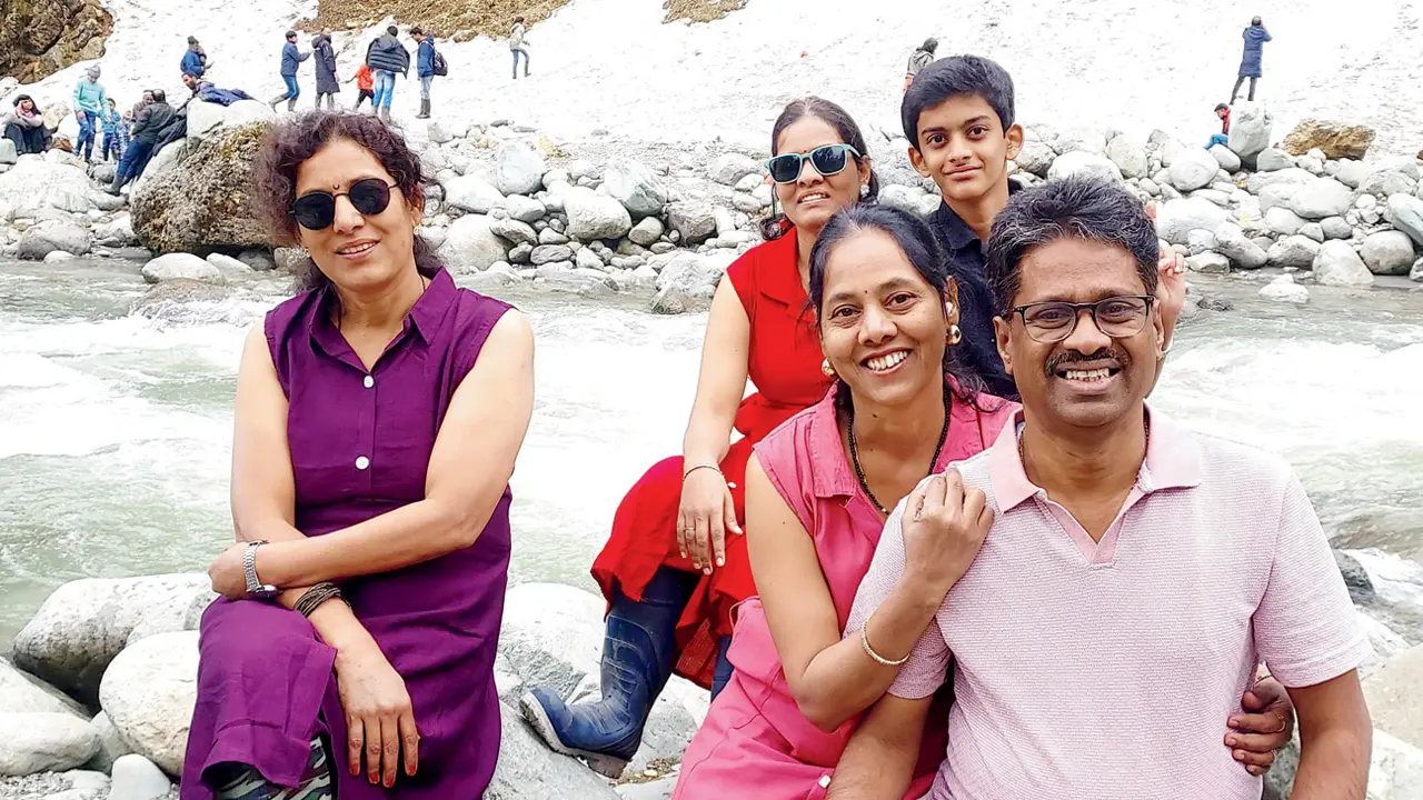 Sandhya Dedge (in red) with family, in Pahalgam just before the attack