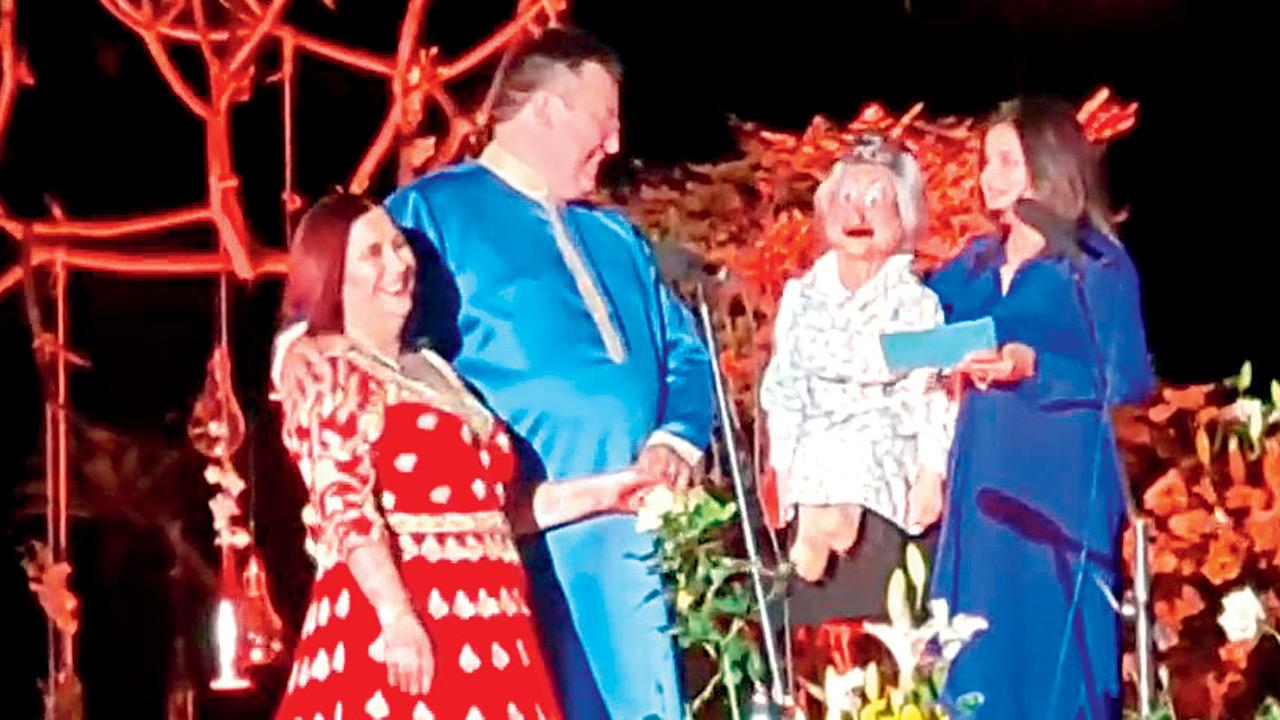 Seema Golchha (right) officiates a wedding with her puppet, Granny