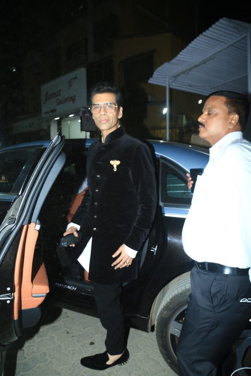 Karan Johar was snapped in the city last night. The Rocky Aur Rani filmmaker was seen wearing a black sherwani paired with matching pants. He posed for the paparazzi before entering his car