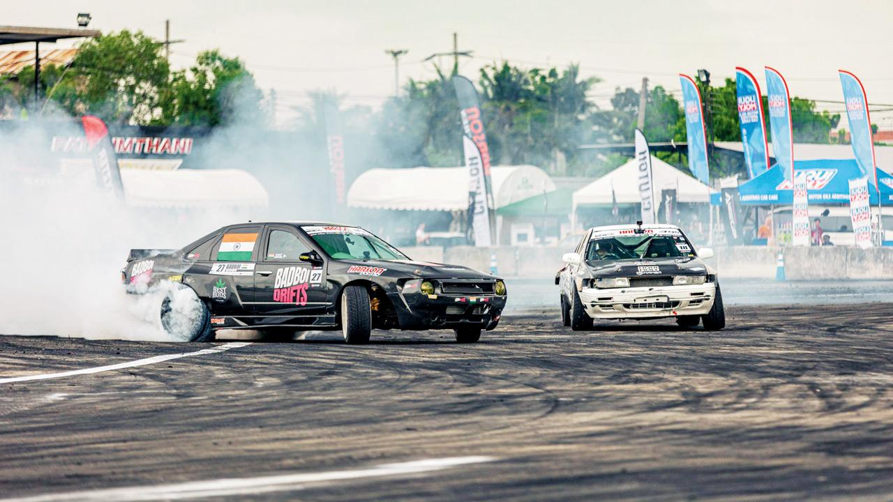 The drivers in action at a competition in Bangkok