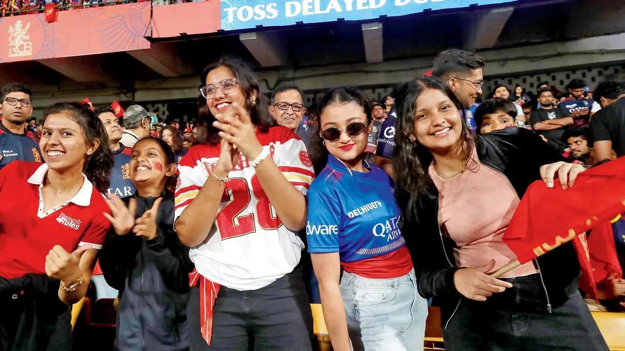 Fans cheer from the stands at a T20 league match earlier this month (Pic: Getty Images)
Accessorise
Fashion designer Asang Kamble suggests to channel your support for the game with a cricket bat or ball-shaped handbag, or one that features a pop or abstract design in your team’s colours