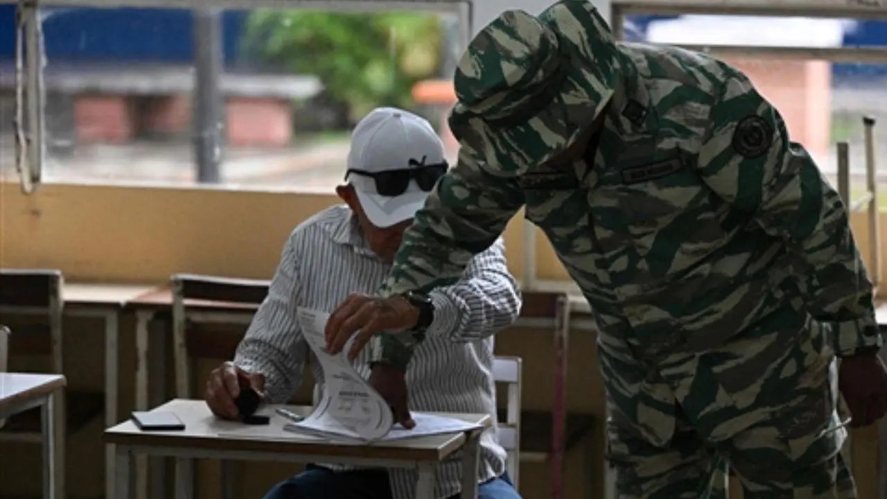 IN PHOTOS: Voters queue up as Venezuela heads to polls
