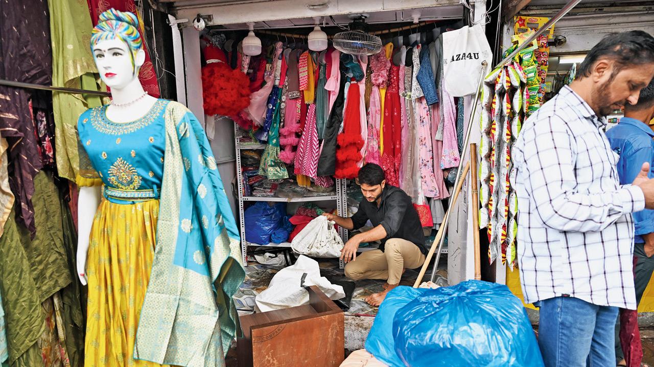 Clothing shops at Hindmata, a day after the low-lying area got flooded on May 26