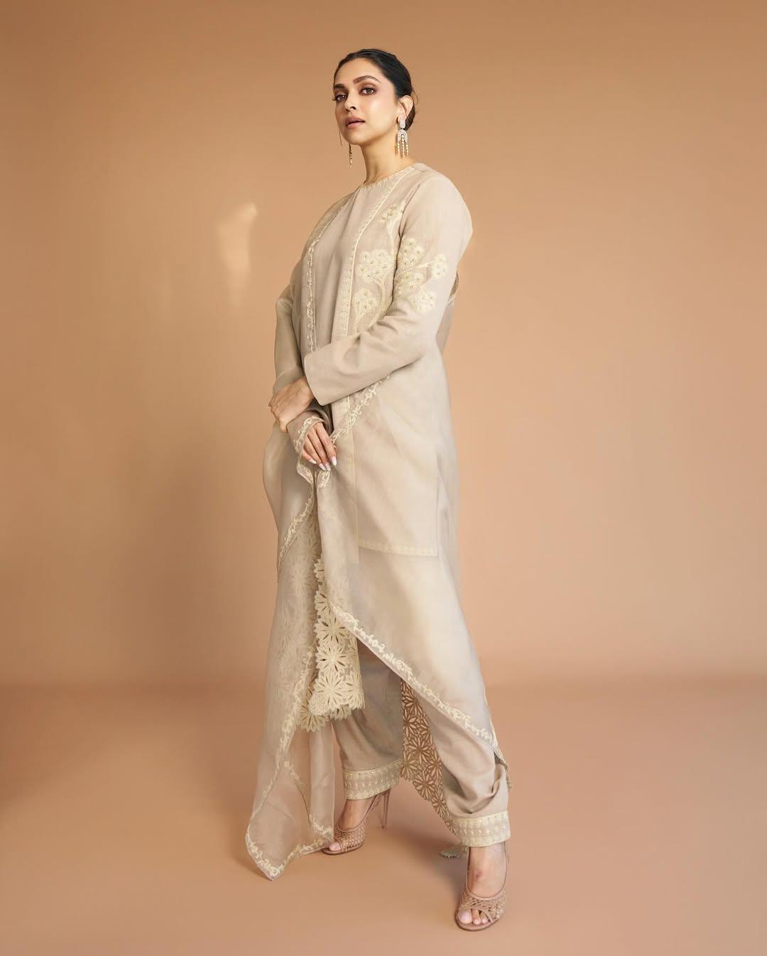 In this look, the actress wore a beige outfit from Masaba Gupta's new range. She tied her hair in a stylish bun and accessorised her appearance with intricate jewellery. She further enhanced her look with high heels