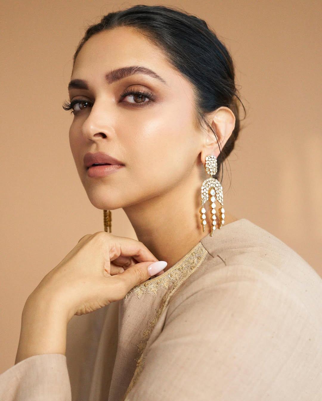 The mother is mothering, as always! Deepika Padukone dropped a couple of pictures from her WAVES Summit look today, and we are sold on her beauty