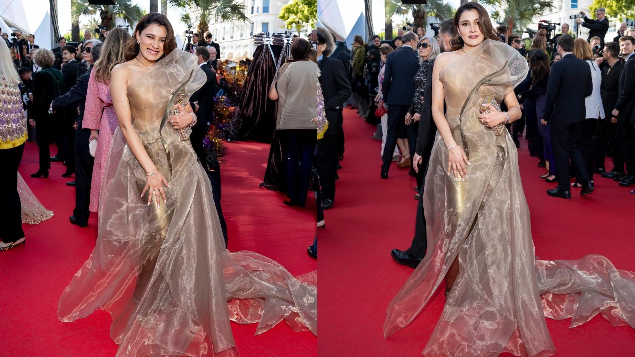Singer Aastha Gill made her Cannes 2025 red carpet debut in a radiant gold off-shoulder gown, expressing her joy by writing, 