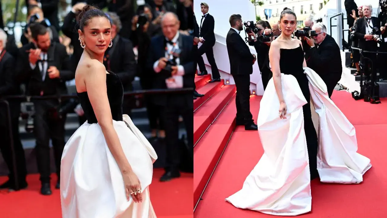 Aditi Rao Hydari arrived at the screening of the film L'Amour Ouf (Beating Hearts) at the 2024 Cannes Film Festival representing the brand L'Oréal. She wore a custom-made Gaurav Gupta outfit: a strapless black gown with a white trail that extended from her waist. Keeping her look minimal, Aditi tied her hair in a top-knot bun, which perfectly complemented her elegant, understated aesthetic
