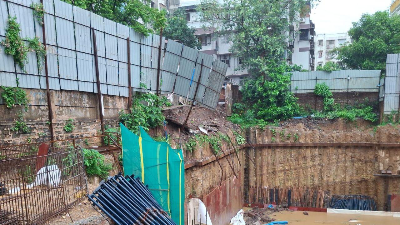 Due to continuous rainfall, soil and debris in the area loosened and were washed away, causing the wall to collapse, authorities said 