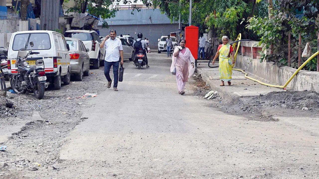 Road No 5 in TPS Colony remains in poor condition. Although asphalt has been laid instead of concrete, gaps and potholes are already visible, and construction debris lines the sides. Residents fear that due to rushed work, the road may cause more problems than before. Pic/Ashish Raje