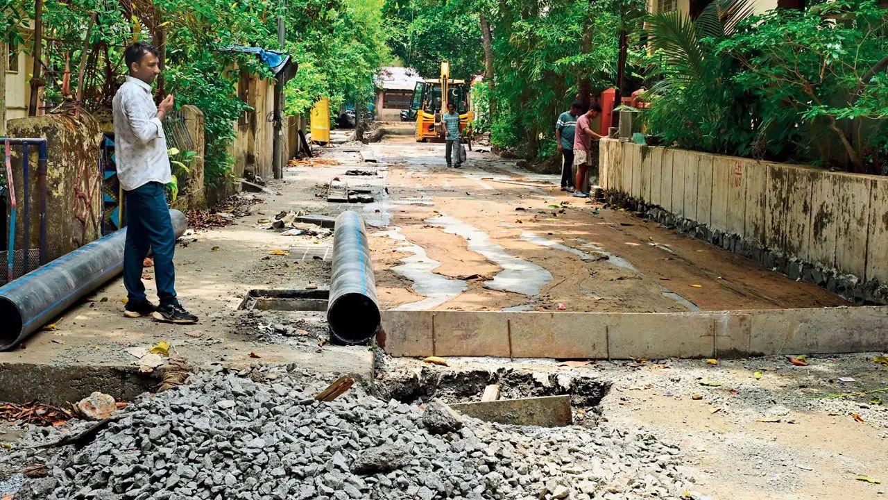 Work began at Shrikrishna Nagar, Borivli East, around the end of February. This is the only crossroad in the area where cement pouring hasn’t even started. Other roads nearby are either fully completed or at least concreted. The deadline is also May 31. Post-rain update (Monday): Cement pouring hasn’t begun. While workers earlier said work would begin Tuesday-Wednesday, they now claim the rain may delay things further. The road closure continues to inconvenience residents indefinitely. Pic/Nimesh Dave