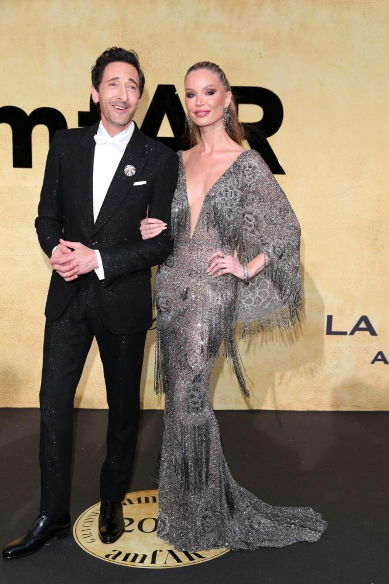US actor Adrien Brody with his wife British fashion designer and actress Georgina Chapma attended the annual American Foundation for AIDS Research amfAR Gala Cannes 2025 at the Hotel du Cap-Eden-Roc in Cap d'Antibes, southern France 