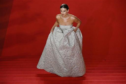US model Carmella Rose stunned onlookers as she walked the red carpet for the screening of La femme la plus riche du monde at the 78th Cannes Film Festival