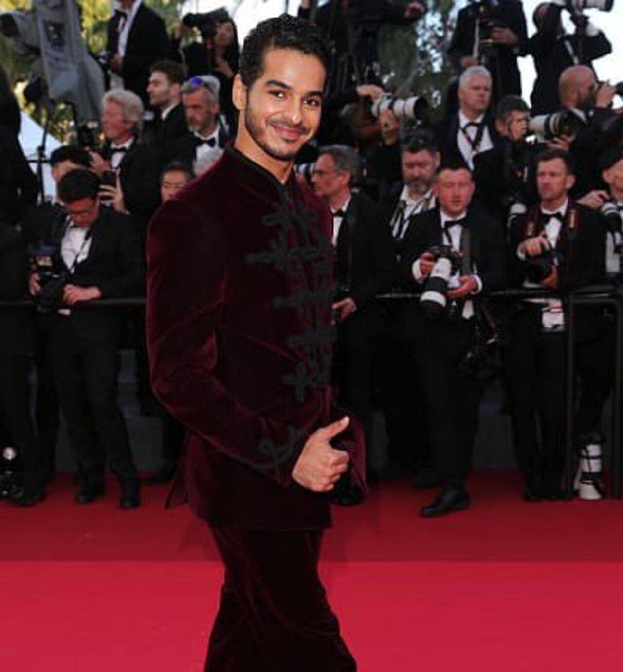 Ishaan Khatter walked the red carpet of Cannes Film Festival for the first time on Tuesday evening. He opted for a crimson ensemble by Gaurav Gupta