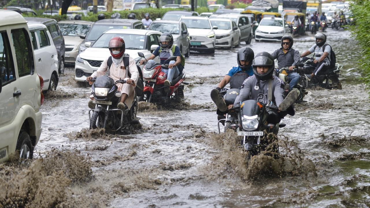Waterlogging complaints were received from Shanti Path, Akbar Road, Teen Murti, Jor Bagh, Kalibari, Mandir Marg, Pandara Road, and BKS Marg. Pics/PTI