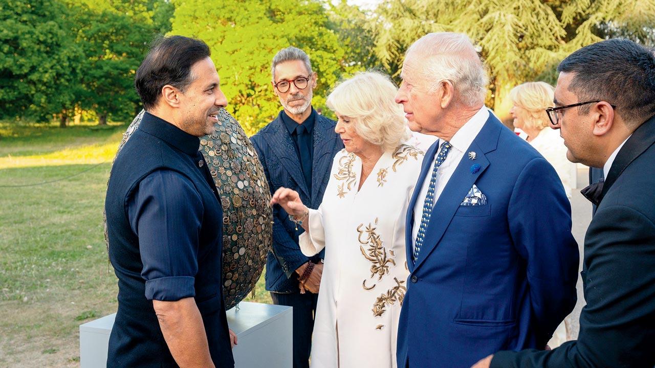 Designer duo Shantnu (left) and Nikhil (second from left) meet King Charles and Queen Camilla at Kew Gardens in London