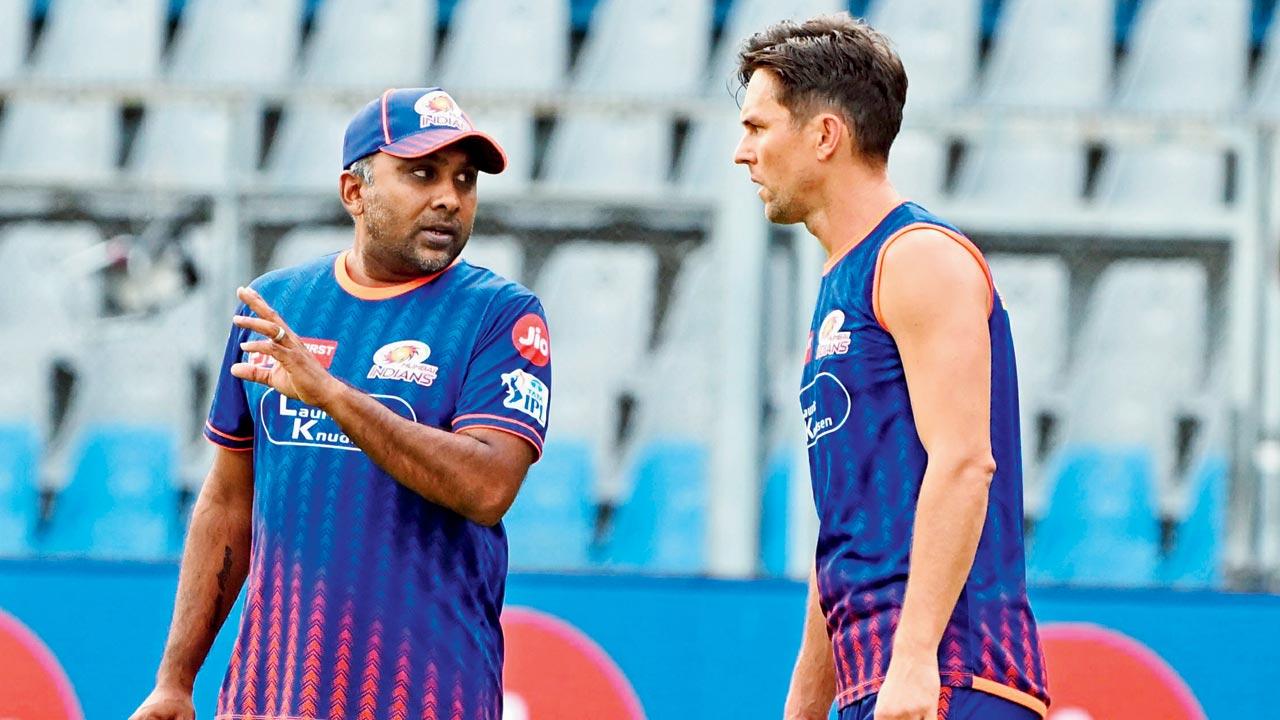 MI coach Mahela Jayawardene with pacer Trent Boult yesterday