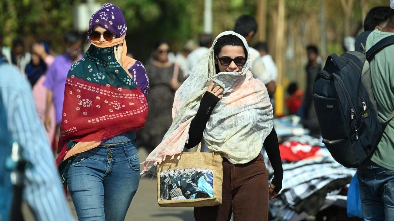 People across city were on Saturday afternoon seen trying to stay cool by drinking more water, wearing light clothes and covering themselves from scorching sun