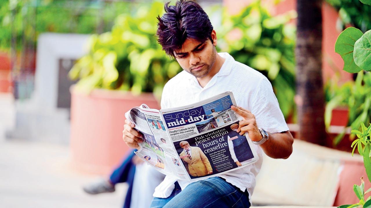 Aaryan Panchal a 22-year-old law student and Kandivli resident notes that he refuses to look at social media for any updates on the current situation, given the current flood of misinformation. For him, print media is the only source he trusts. Pic/Nimesh Dave