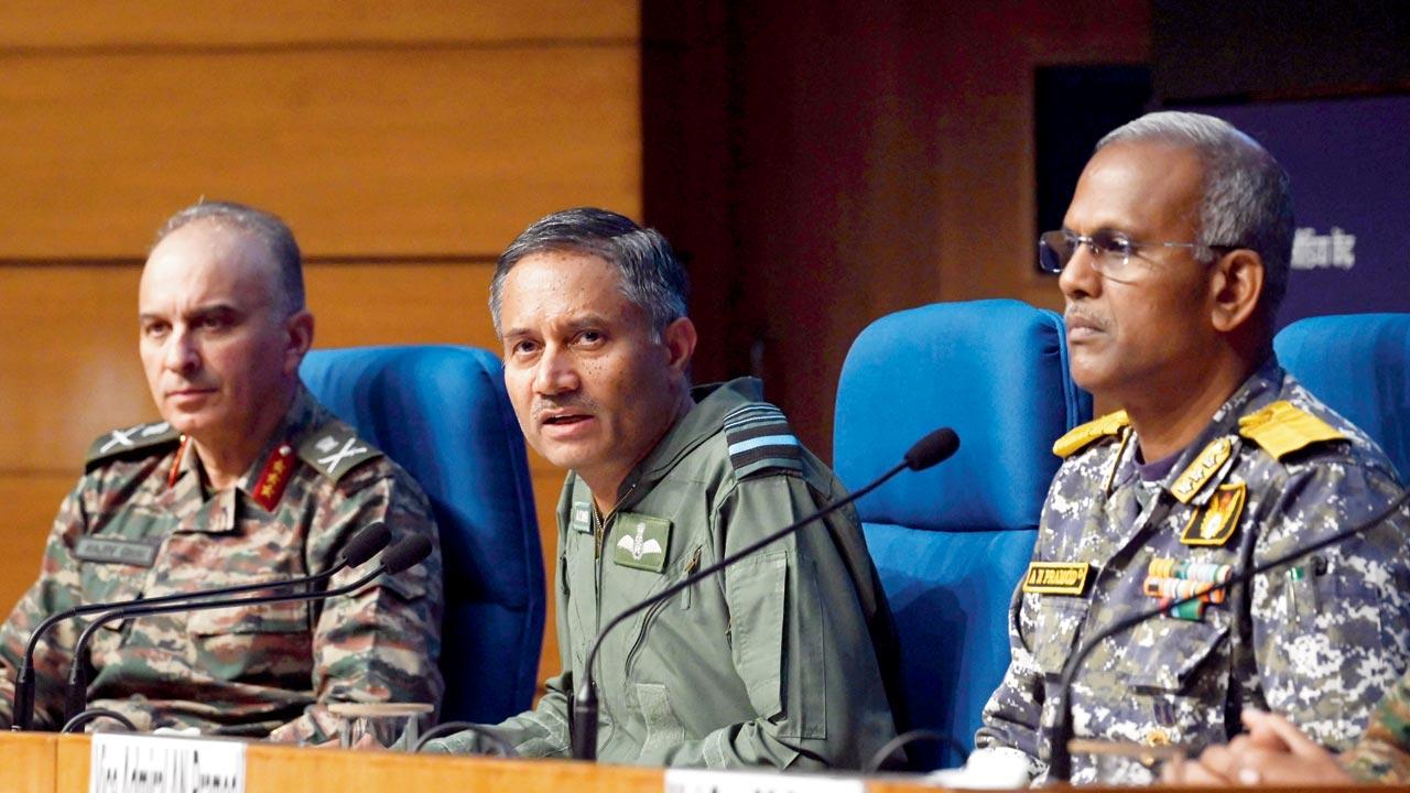 Director General of Military Operations (DGMO) Lt General Rajiv Ghai (left) with Air Marshal AK Bharti (centre) and Vice Admiral AN Pramod (right) clarified rumours stating that India had not struck the alleged nuclear site in Kirana Hills in Pakistan at a press conference on May 12. Pic/Getty Images