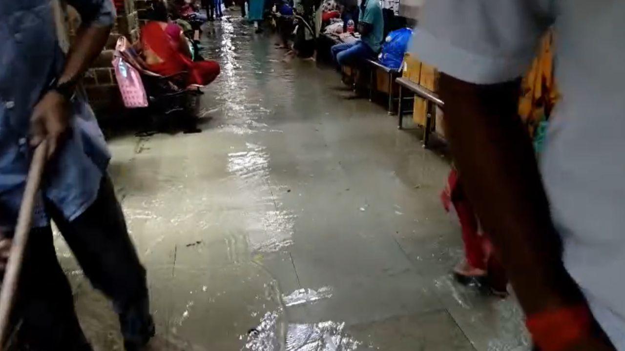 Patients, some of whom were on stretchers, were left stranded as water levels continued to rise, with staff members trying to navigate the watery mess to assist