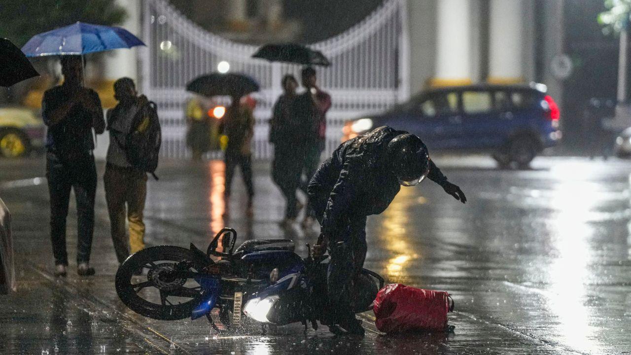 Kolkata residents were caught off guard as unseasonal rains swept across the city this week