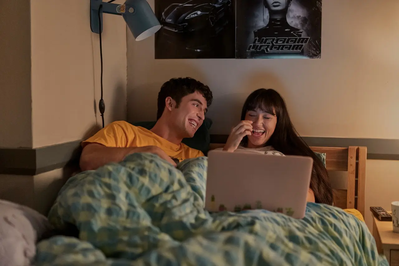 Overcompensating (May 15, Prime Video)
Overcompensating is a college-set ensemble comedy about the wild, chaotic journey of Benny, a closeted former football player and homecoming king, as he becomes fast friends with Carmen, a high school outsider on a mission to fit in at all costs. With guidance from Benny’s older sister and her campus-legend boyfriend, Benny and Carmen juggle horrible hookups, flavored vodka, and fake IDs. Deeply funny and personal, the show explores the lengths to which we all overcompensate while on the path to finding out who we really are