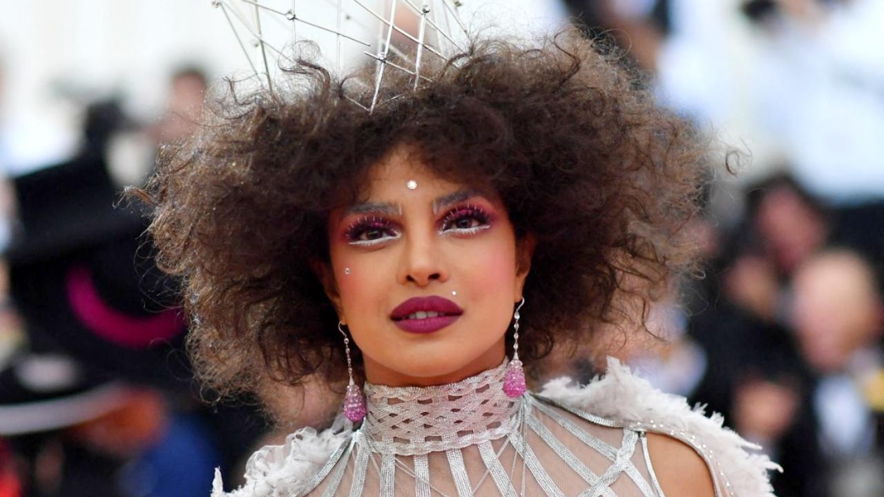 Priyanka Chopra will reportedly sashay in style at the Metropolitan Museum of Art in New York after giving the MET Gala a miss last year. Read to know more details about her return. Read more