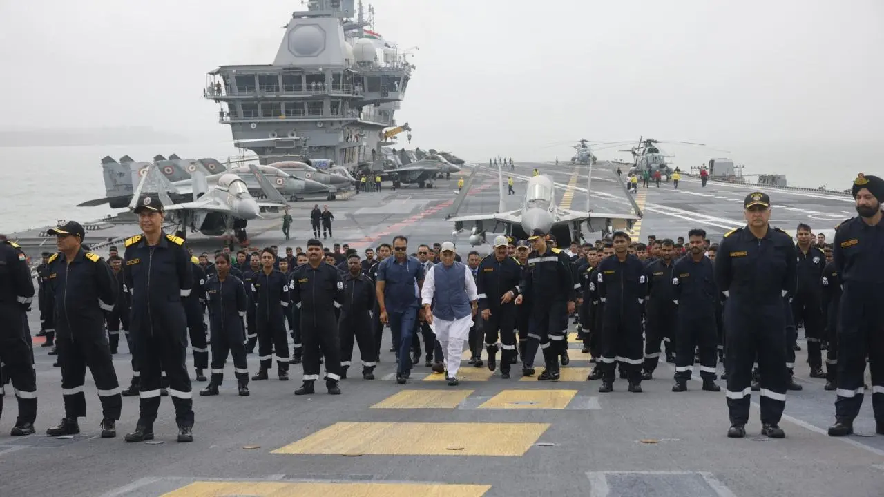 IN PHOTOS: Rajnath Singh meets Indian Navy personnel on board INS Vikrant