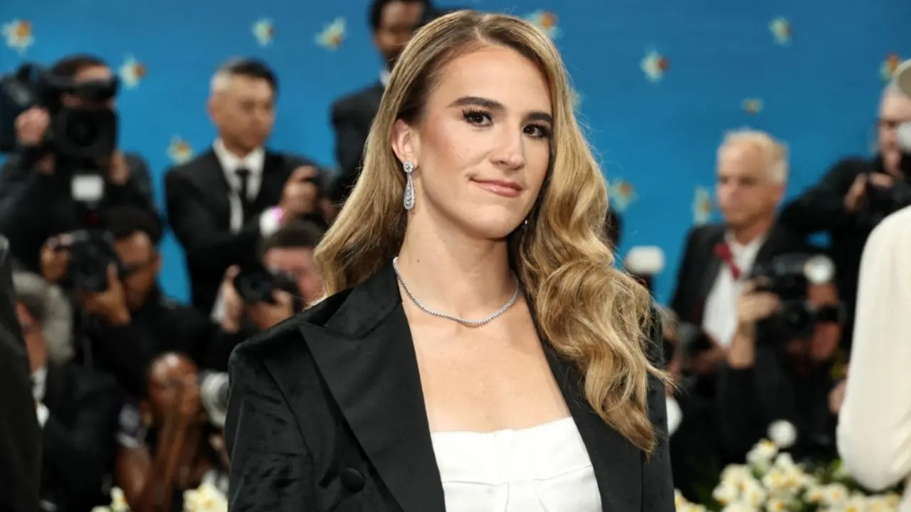 Fellow WNBA star Sabrina Ionescu, fresh off her first league title, wore a black floor-length skirt, white bralette, and a sharp suit jacket, balancing edgy elegance with athletic poise