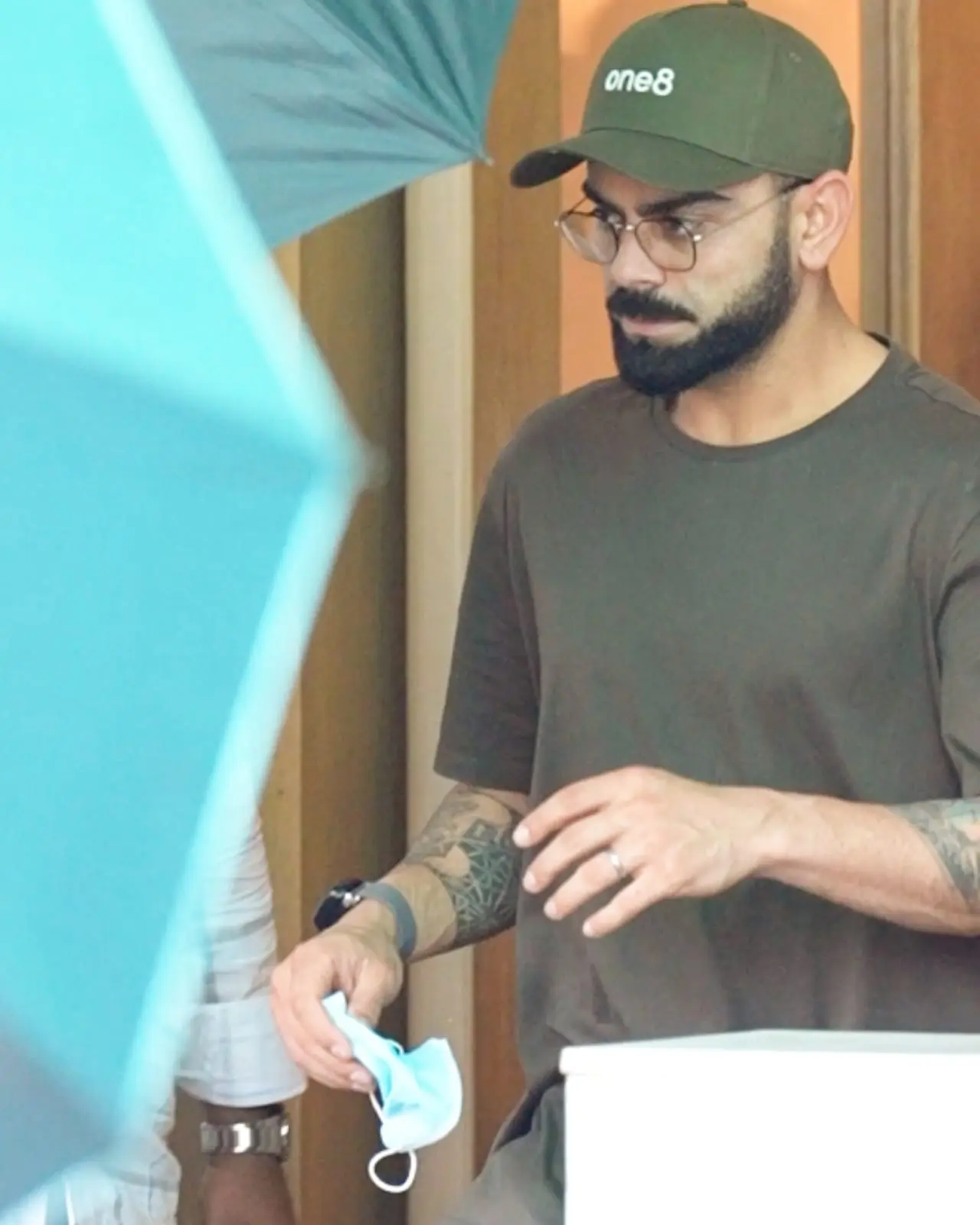 Virat Kohli was snapped at Mumbai airport a day after the IPL was suspended due to ongoing India-Pakistan tensions. The ace cricketer avoided posing for the camera