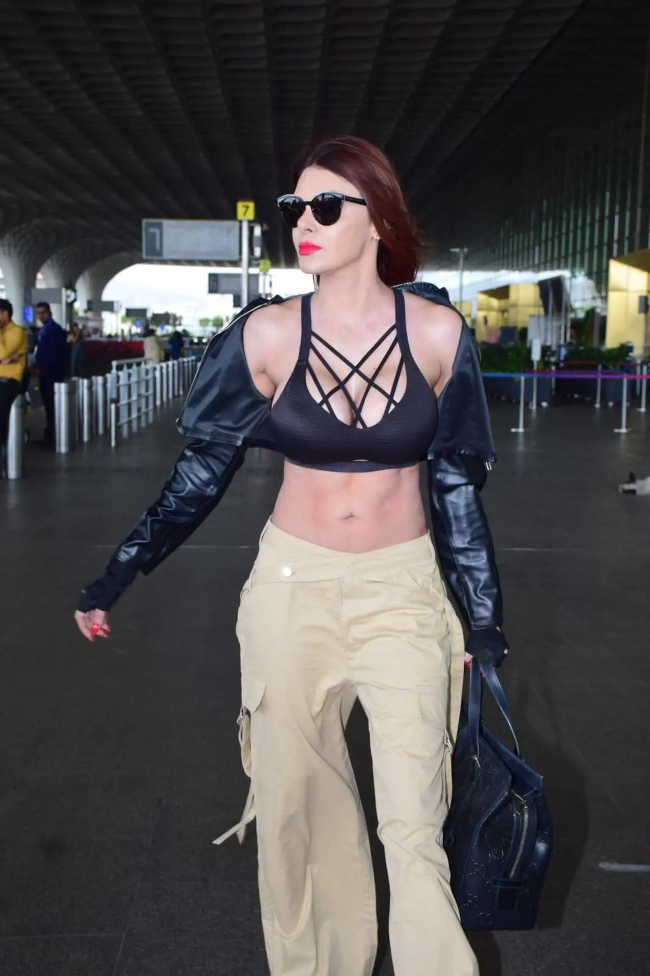 Sheryln Chopra was seen in a bold attire at the airport
