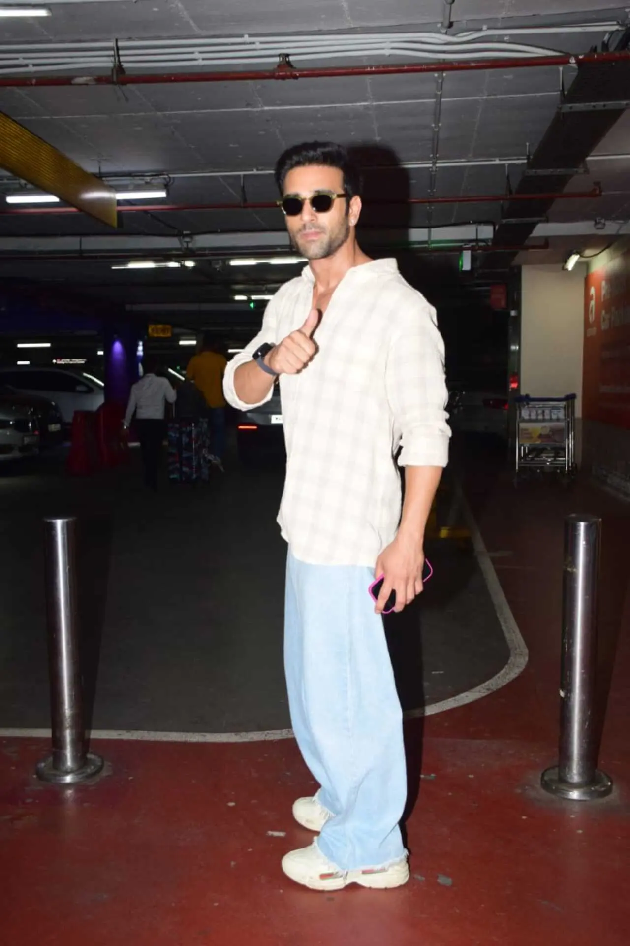 Actor Pulkit Samrat gave a thumbs up to the paparazzi as he got papped at the arrival area of Mumbai airport