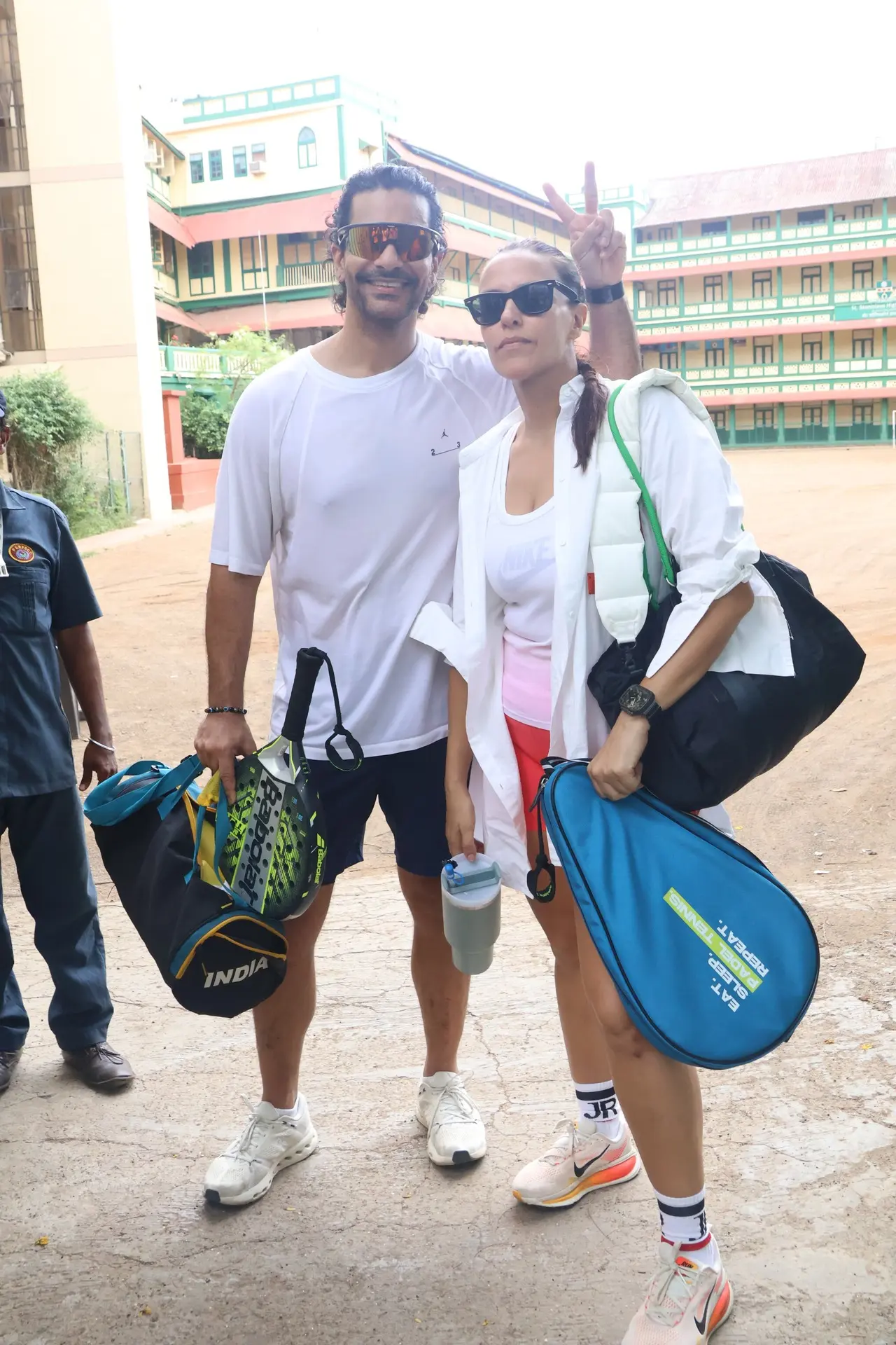 Neha Dhupia and Angad Bedi spotted after a game of racket in the city. Angad Bedi seemed to be in a jovial mood after the game 