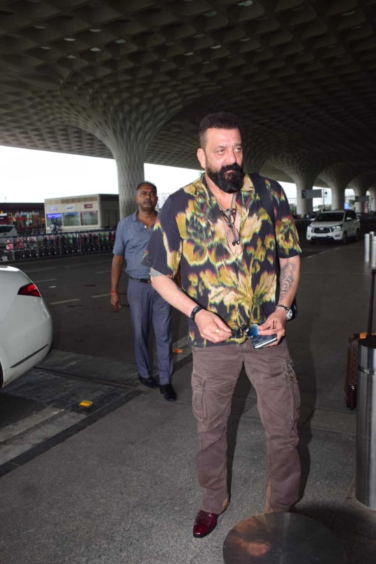 Sanjay Dutt was spotted at the Mumbai airport on Sunday evening in a printed brown shirt