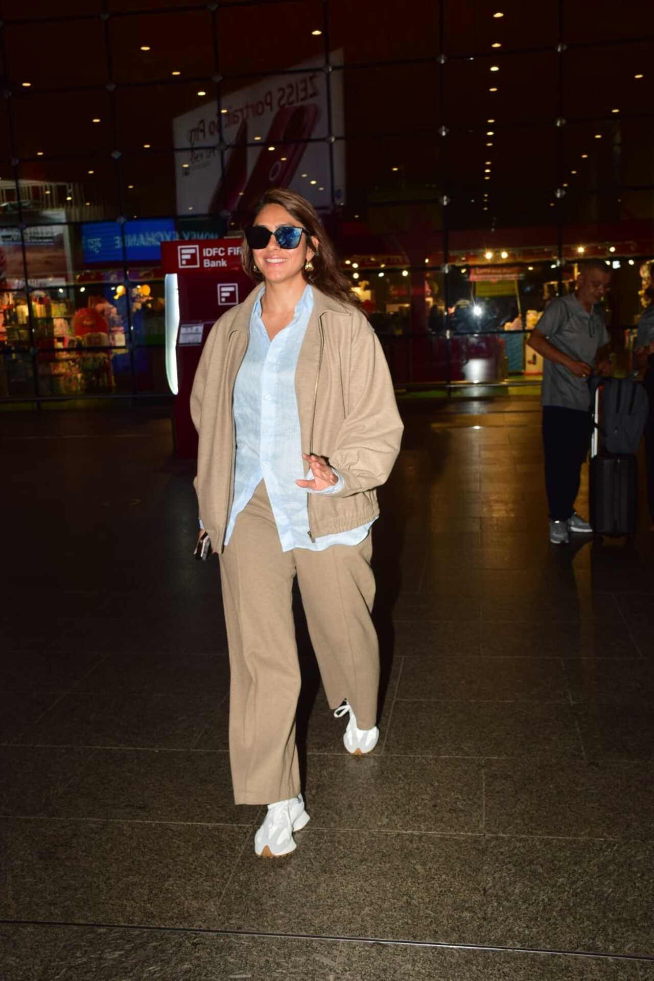Mrunal Thakur was spotted at the airport arrivals on Tuesday morning. She was shooting for David Dhawan's upcoming film in Scotland