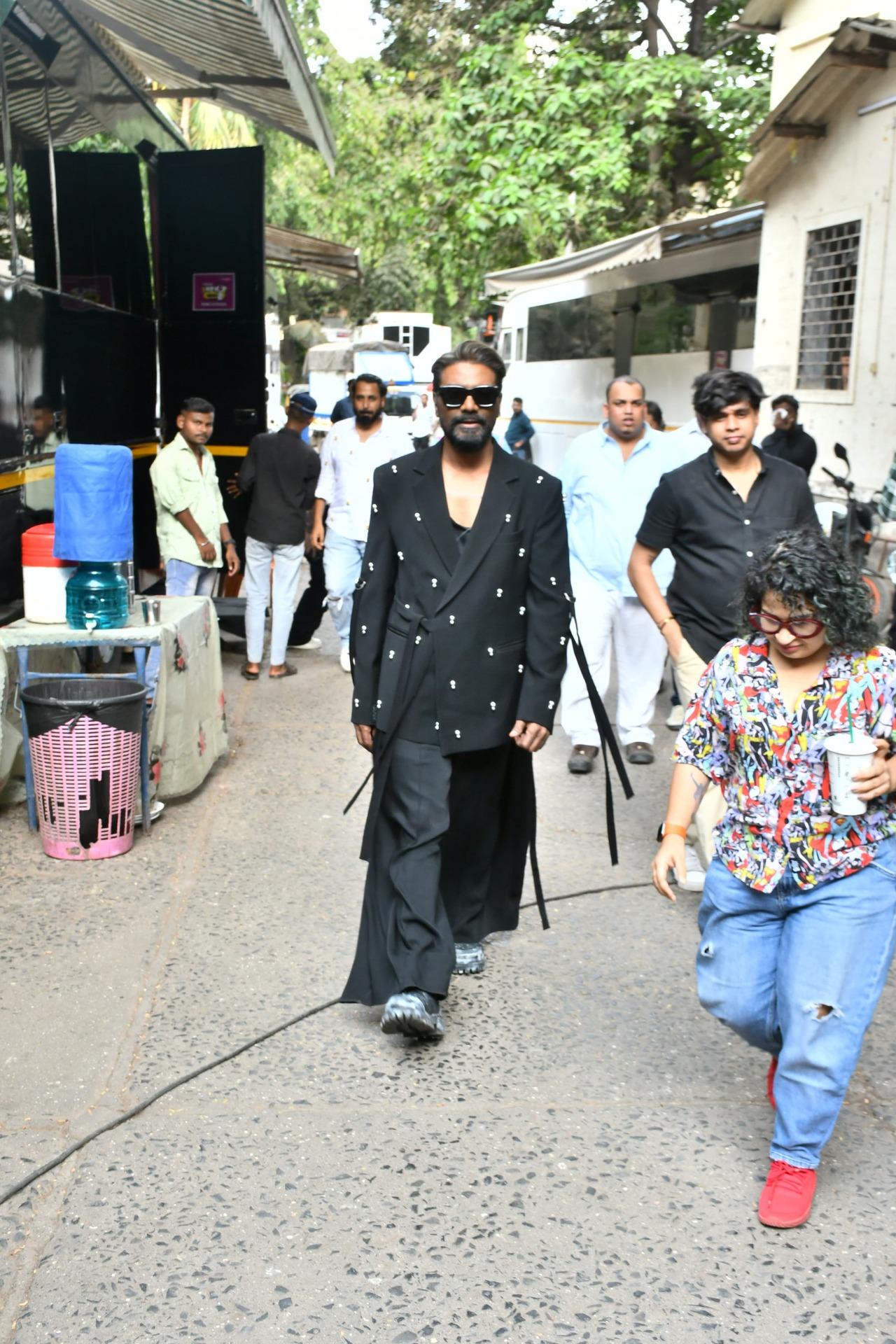 Remo D'Souza was seen in an oversized formal look for the shoot of a dance reality show that he is hosting