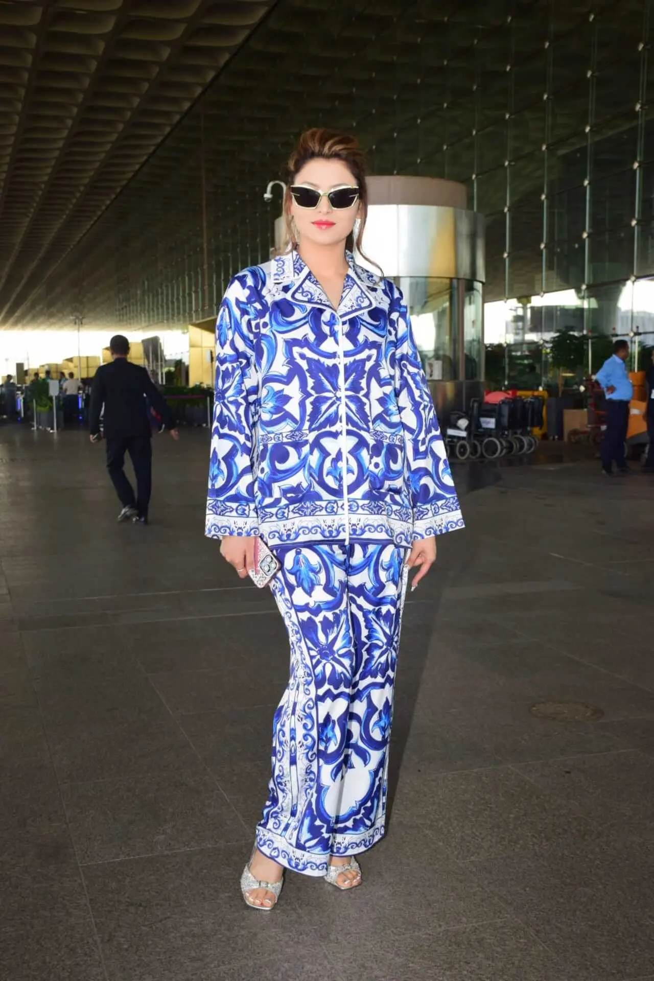 Urvashi Rautela looked bright in a blue co-ord fit with sunglasses for her airport look